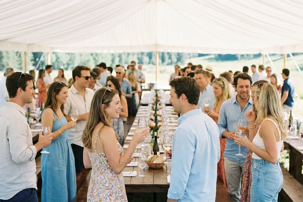 Elegant guests enjoying the Grand Tasting Pavilion at Aspen Wagner Park